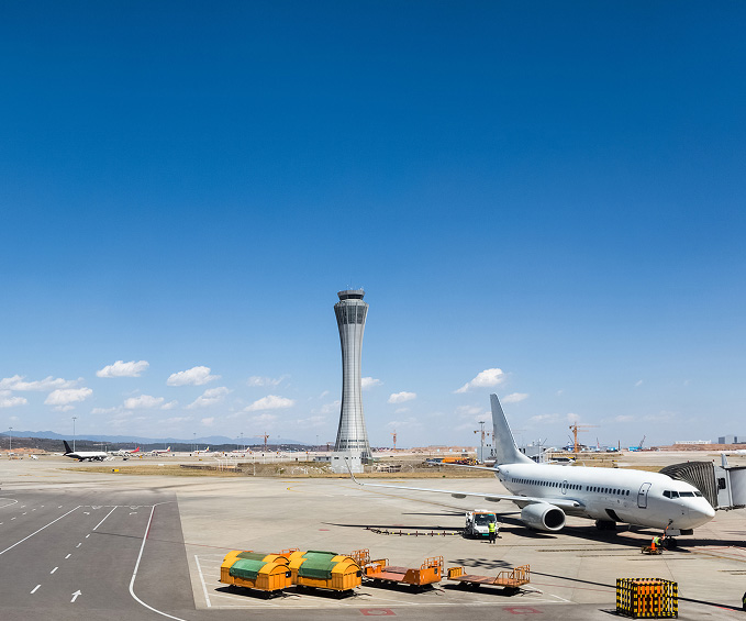 Airport tarmac with a parked aircraft illustrating the use of biofuels