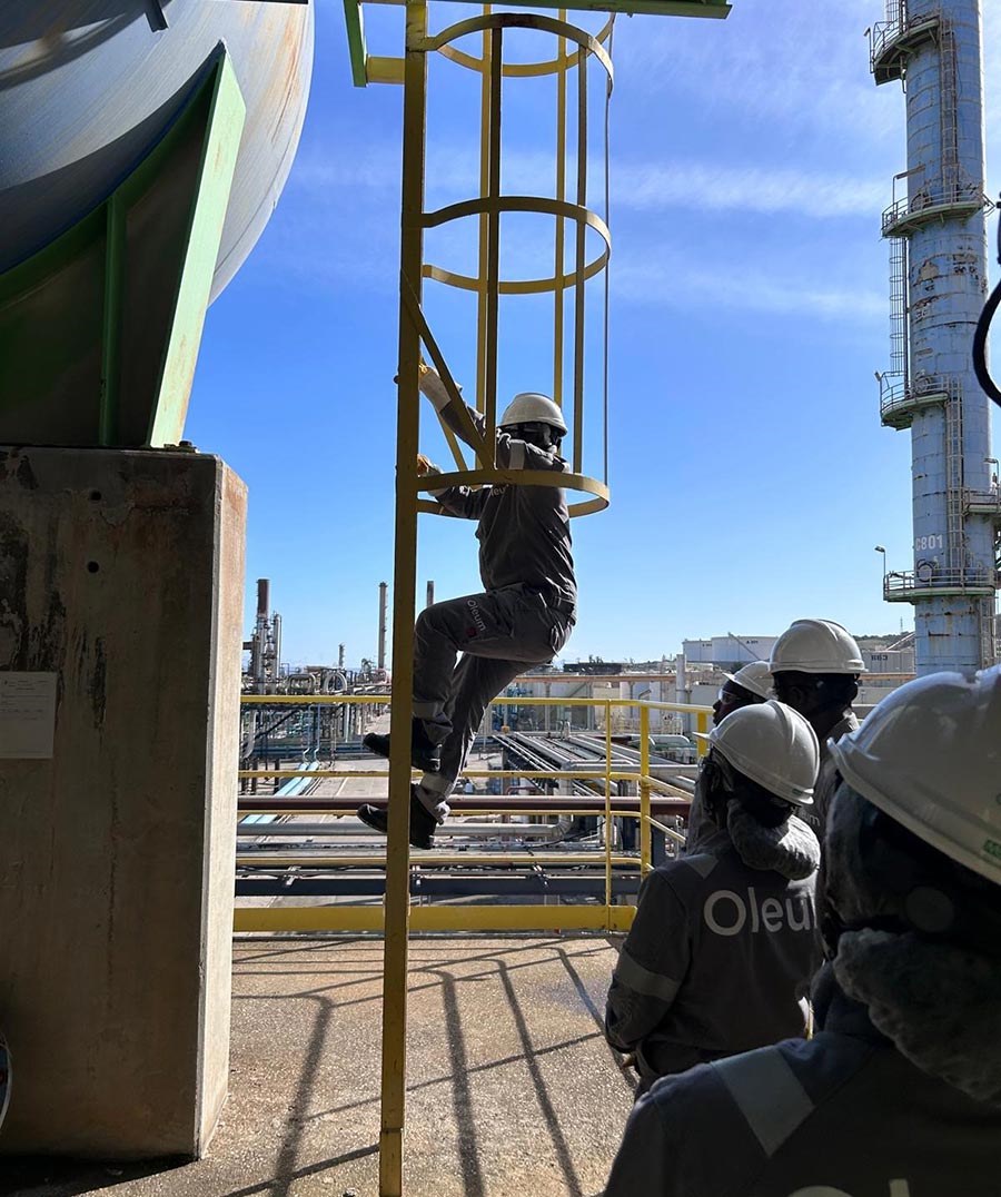 Real-world training exercise using a safety ladder at the Oleum technical center
